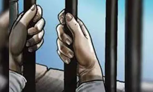 தனியார் நிறுவன மேலாளரை தாக்கியவர் கைது