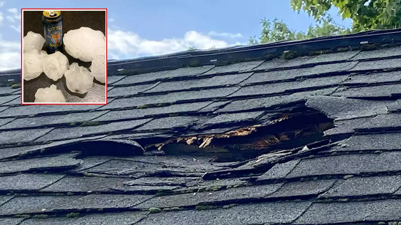 அமெரிக்கா:  வானில் இருந்து திடீரென விழுந்து வீட்டில் ஓட்டை போட்ட பெரிய பனிக்கட்டி