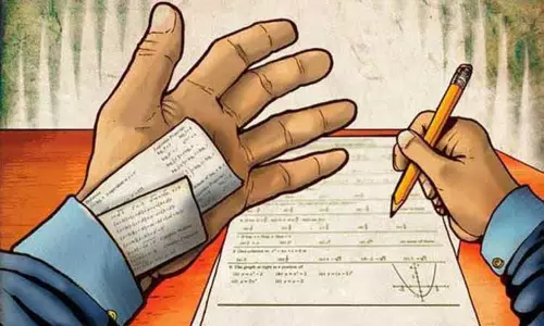 சப்-இன்ஸ்பெக்டர் தேர்வில் காப்பி அடித்து சிக்கிய போலீஸ்காரர் மனைவி