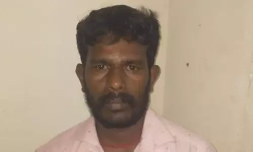 வாலிபரை கட்டையால் தாக்கி கொலை செய்த கட்டிட தொழிலாளிக்கு ஆயுள் தண்டனை