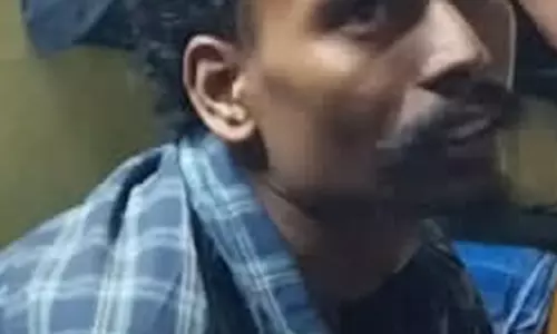 ஓட்டல் மாடியில் ஏறி தற்கொலைக்கு முயன்ற ஊழியர்