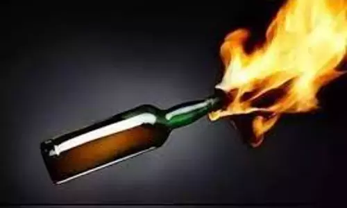 சிகரெட் பிடித்ததில் ஏற்பட்ட தகராறில் பெட்ரோல் குண்டு வீச்சு