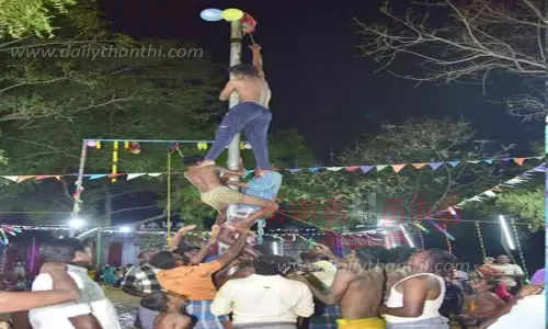 வழுக்கு மரம் ஏறும் போட்டி வழுக்கு மரம் ஏறும் போட்டி