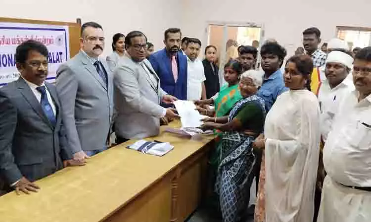 தேசிய மக்கள் நீதிமன்றத்தில் 1,717 வழக்குகளுக்கு தீர்வு