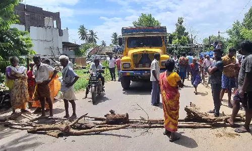 செல்போன் கோபுரத்தில் ஏறி வாலிபர் தற்கொலை மிரட்டல்