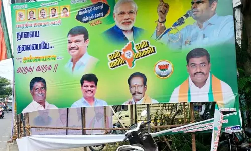 தாராபுரத்தில் பா.ஜனதா பேனர் கிழிப்பு