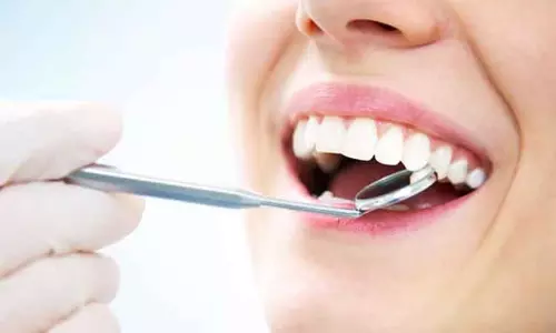 மதுபோதையில் வாலிபரின் பல்லை பிடுங்கிய டாக்டர்