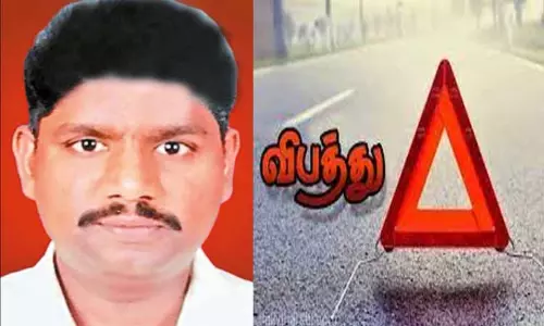 லாரி சக்கரத்தில் சிக்கி அரிசி மண்டி உரிமையாளர் பலி