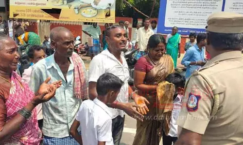 கூலி தொழிலாளி குடும்பத்துடன் தீக்குளிக்க முயன்றதால் பரபரப்பு