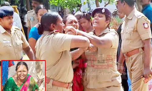 உடலில் மண்எண்ணெய் ஊற்றி தீக்குளிக்க வந்த பெண்