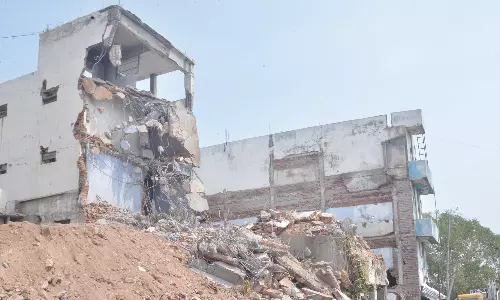 சுரங்க பாலம் பணிக்கு கட்டிடங்கள் இடிப்பு