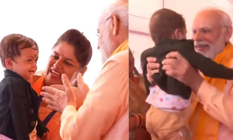 தேர்தல் களத்தில் ருசிகரம்: மழலையின் புன்னகையில் விழுந்த பிரதமர் மோடி