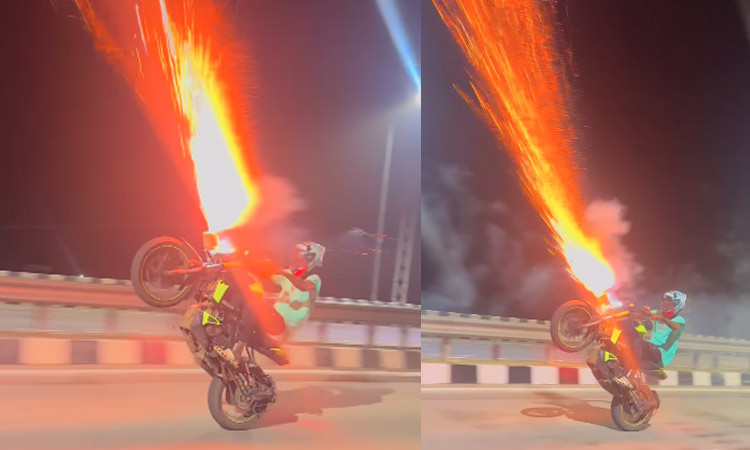 பைக்கில் பட்டாசு வெடித்துக்கொண்டே வீலிங் செய்த இளைஞர் - அதிர்ச்சி வீடியோ