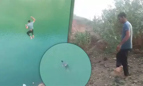 இன்ஸ்டா ரீல்ஸ்-காக 100 அடி உயரத்தில் இருந்து ஏரியில் குதித்த இளைஞர் தண்ணீரில் மூழ்கி பலி - வைரல் வீடியோ