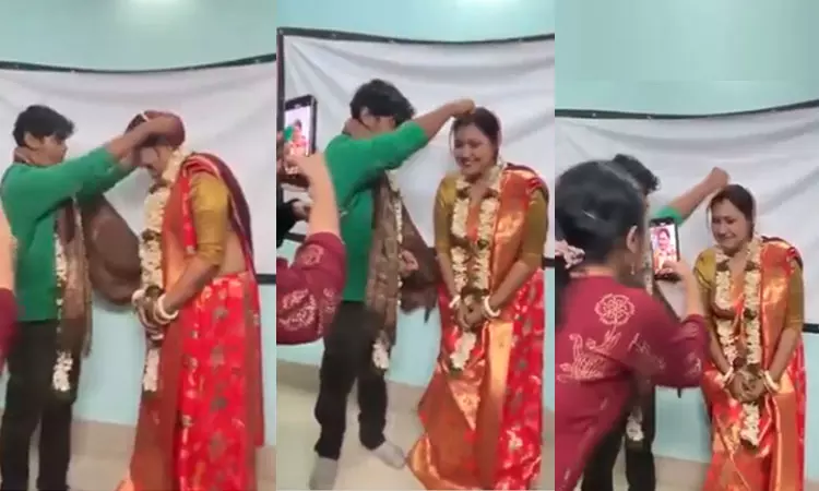 வகுப்பறையில் மாணவரை திருமணம் செய்து கொண்ட பேராசிரியை; வைரலான வீடியோ வகுப்பறையில் மாணவரை திருமணம் செய்து கொண்ட பேராசிரியை; வைரலான வீடியோ