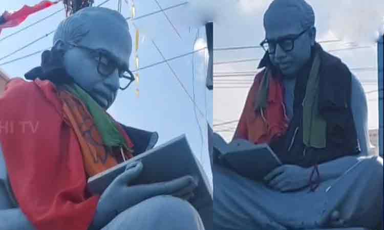 அண்ணா சிலை மீது திமுக - பாஜக கொடி: தஞ்சாவூரில் பரபரப்பு