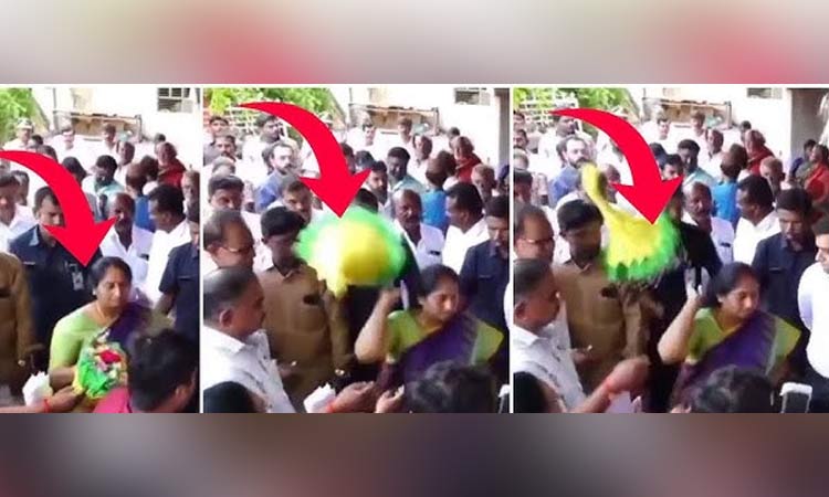 அதிகாரி கொடுத்த பூங்கொத்தை தூக்கி வீசிய மந்திரி - வைரல் வீடியோ