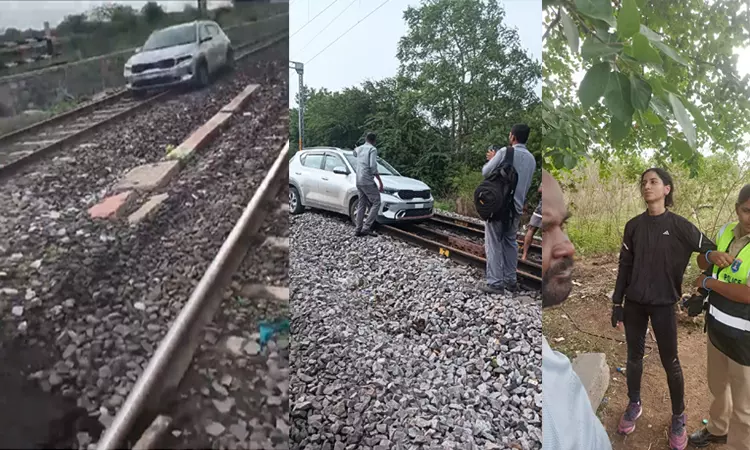 ரெயில் பாதையில் மது போதையில் காரை ஓட்டிய இளம்பெண்; ஐதராபாத்தில் பரபரப்பு