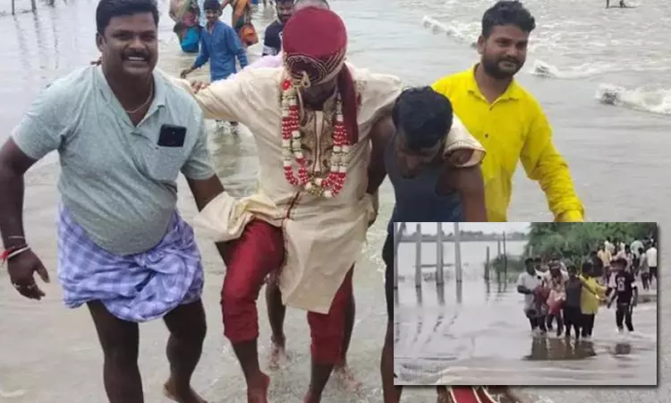 கனமழையால் வெள்ளம்.. மணமகனை தண்ணீரில் தூக்கிச்சென்ற உறவினர்கள்  வீடியோ வைரல்