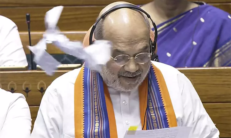 பிரதமர், முதல்-மந்திரிகளை பதவி நீக்கம் செய்யும் மசோதா தாக்கல்; மசோதாக்களை கிழித்தெறிந்து எதிர்க்கட்சிகள் அமளி