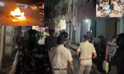 போலீசார் மீது தாக்குதல்; 5 பேர் காயம், வாகனங்களுக்கு தீ வைப்பு