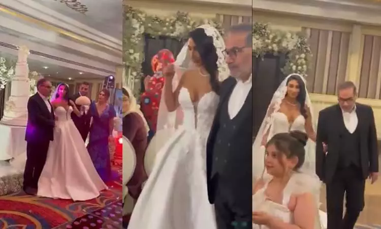 ஊருக்குதான் உபதேசம்... ஈரான் பாதுகாப்பு அதிகாரி மகளின் திருமணத்தில் அரை குறை ஆடை, ஹிஜாப் இல்லை; வைரலான வீடியோ ஊருக்குதான் உபதேசம்... ஈரான் பாதுகாப்பு அதிகாரி மகளின் திருமணத்தில் அரை குறை ஆடை, ஹிஜாப் இல்லை; வைரலான வீடியோ