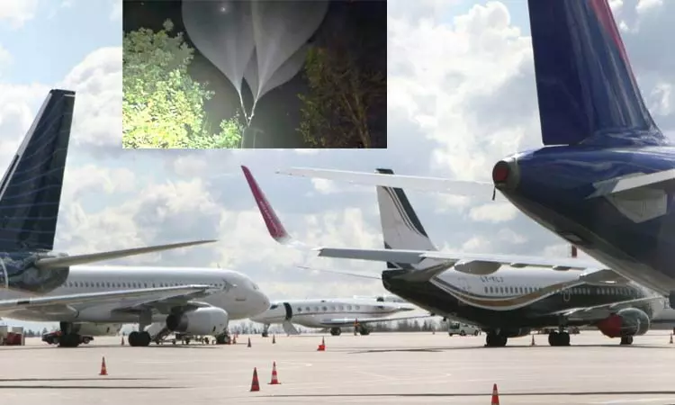 விமான நிலையம் அருகே பறந்த மர்ம பலூன்கள்; விமான சேவை நிறுத்தம்