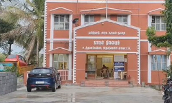 குளியல் அறையில் ரகசிய கேமரா - பெண் கைது