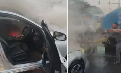 நடுரோட்டில் தீப்பற்றி எரிந்த சொகுசு கார் - 5 வயது மகனுடன் உயிர் தப்பிய பெண்