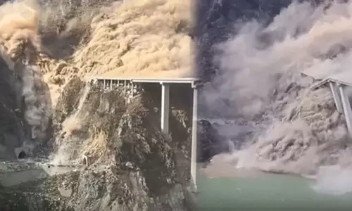 சீனாவில் புதிதாக திறக்கப்பட்ட பாலம்  நிலச்சரிவால் இடிந்து விழுந்தது