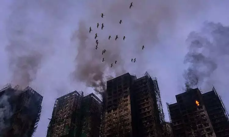 ஹாங்காங் தீ விபத்து; பலி எண்ணிக்கை 128 ஆக உயர்வு