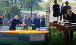 மகாத்மா காந்தி நினைவிடத்தில் புதின் மரியாதை மகாத்மா காந்தி நினைவிடத்தில் புதின் மரியாதை