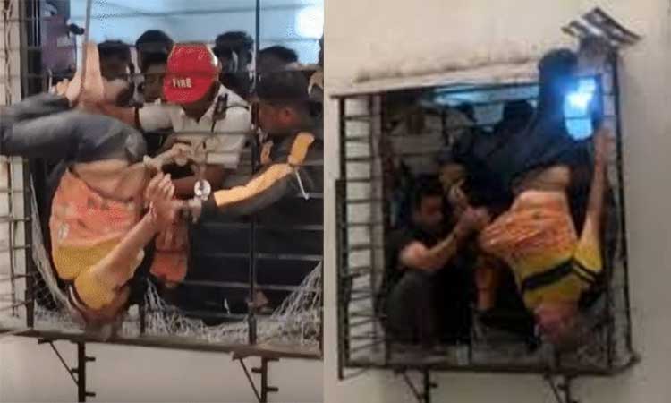 தூக்கத்தில் 10-வது மாடியில் இருந்து உருண்டு விழுந்த நபர் - ஜன்னல் கம்பியில் சிக்கி உயிர் தப்பிய அதிசயம்