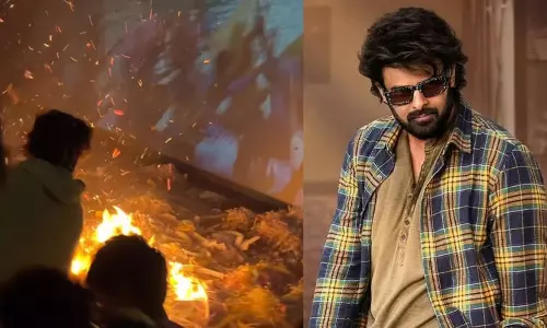 பிரபாஸ் படத்திற்கு ஆரத்தி எடுத்த ரசிகர்கள்; திரையரங்கில் தீ பிடித்ததால் பரபரப்பு