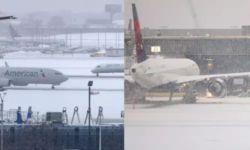 அமெரிக்காவில் பனிப்புயல்: 13 ஆயிரம் விமானங்கள் ரத்து